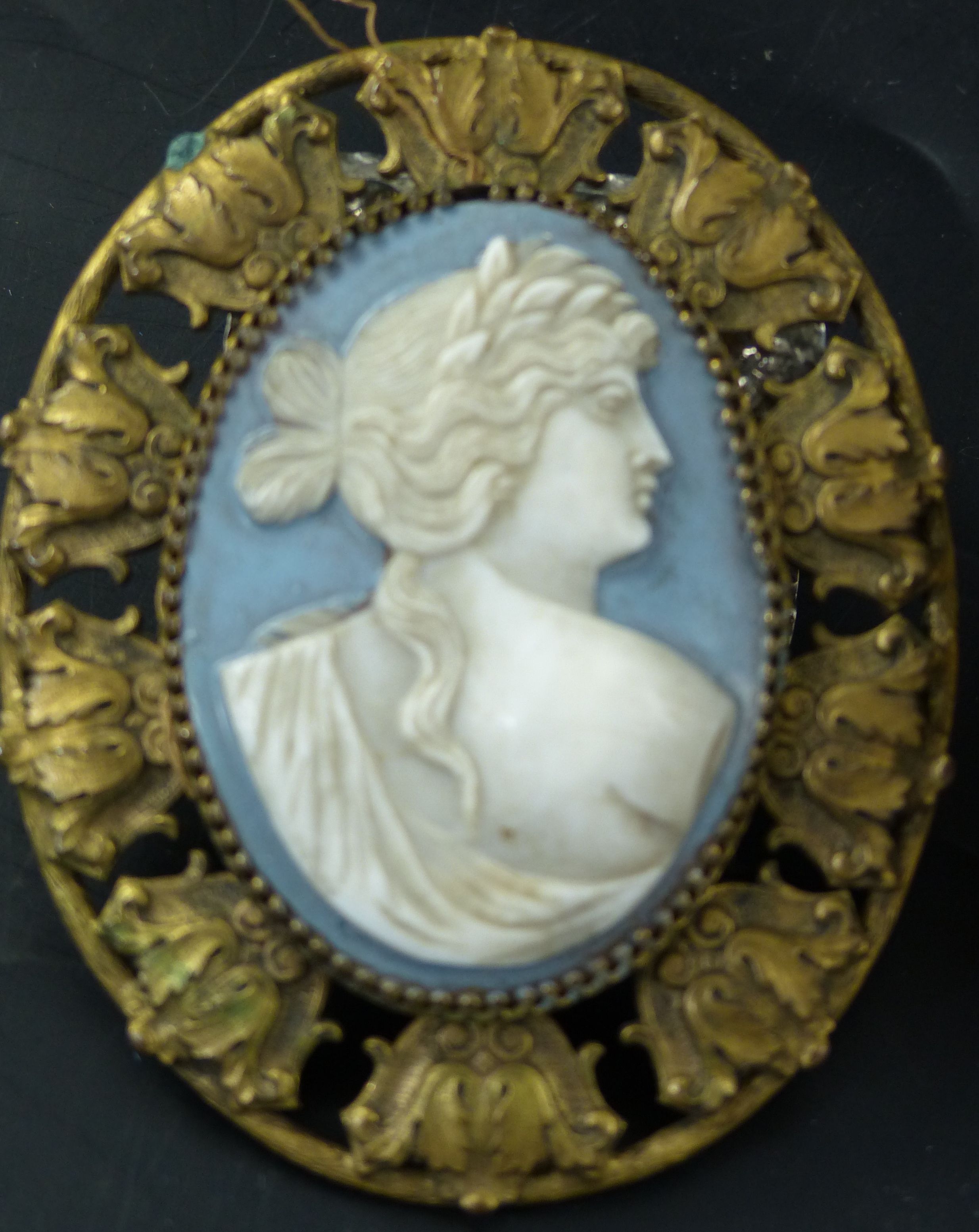 An Edwardian silver mounted vertical cigar cutter with dished stem, Chester, 1901, 10.5cm and a jasper cameo plaque